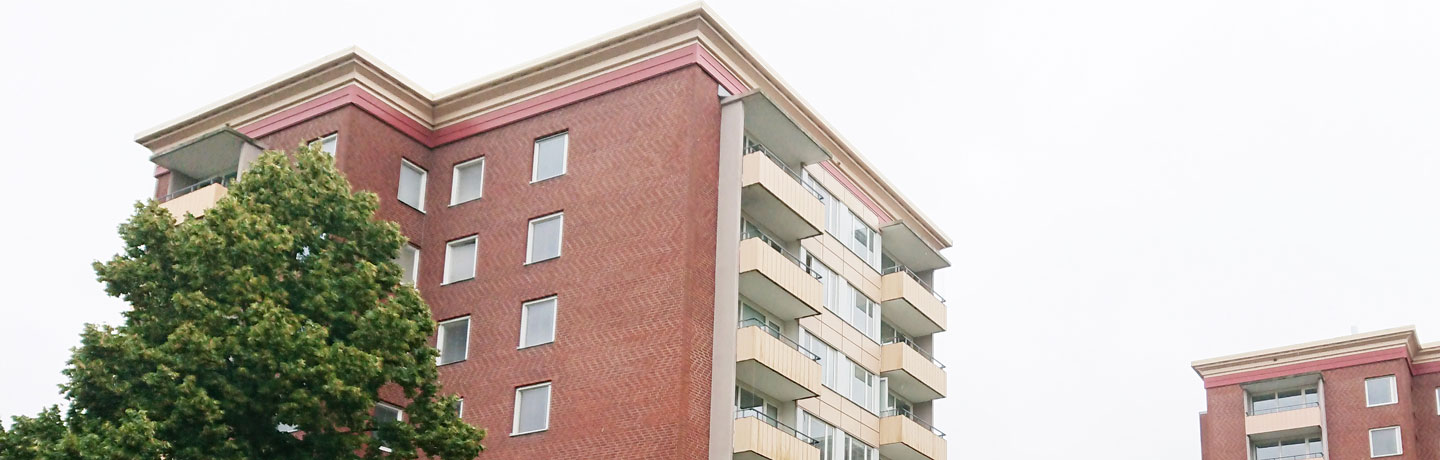 Lantmannavägen 12 & 14. Höghus i tegel med balkonger