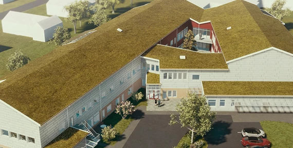 Visionsbild över det nya boendet på Hagtornsstigen i Trollhättan. Vitt tvåvåningshus i vinkel med sedumtak
